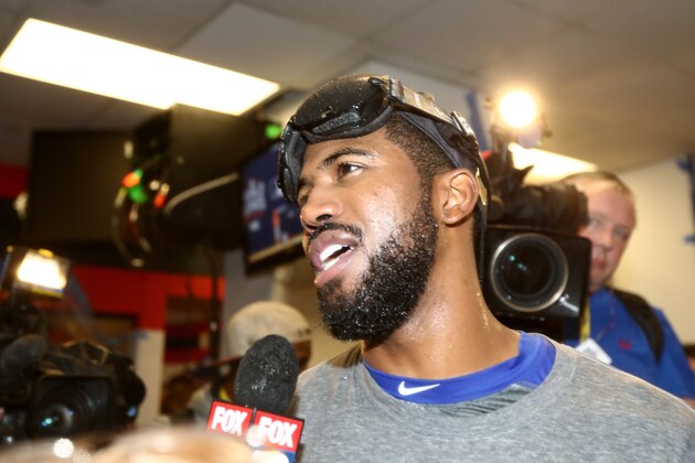 CLEVELAND, OH - NOVEMBER 02:  Dexter Fowler #24 of the Chicago Cubs is interviewed in the clubhouse after the Chicago Cubs defeated the Cleveland Indians 8-7 in Game Seven of the 2016 World Series at Progressive Field on November 2, 2016 in Cleveland, Ohio. The Cubs win their first World Series in 108 years.  (Photo by Elsa/Getty Images)