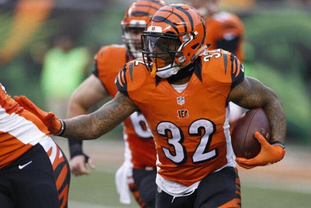 Cincinnati Bengals running back Jeremy Hill (32) runs the ball in the second half of an NFL football game against the Philadelphia Eagles, Sunday, Dec. 4, 2016, in Cincinnati. (AP Photo/Gary Landers)