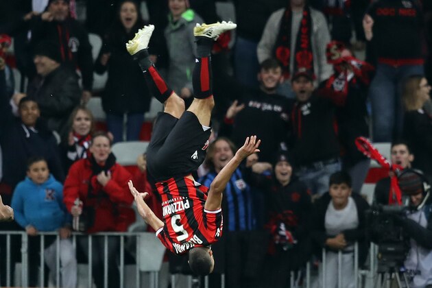 TOPSHOT - Nice's French-born Moroccan midfielder Younes Belhanda celebrates after scoring a goal during the French L1 football match Nice (OGCN) vs Toulouse (TFC) on December 4, 2016 at the 'Allianz Riviera' stadium in Nice, southeastern France.  / AFP / VALERY HACHE        (Photo credit should read VALERY HACHE/AFP/Getty Images)