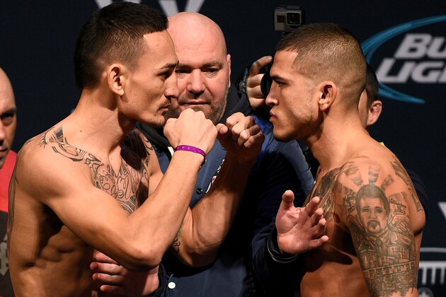 TORONTO, CANADA - DECEMBER 09:  Opponents (L-R) Max Holloway and Anthony Pettis face off during the UFC weigh-in at Air Canada Centre on December 9, 2016 in Toronto, Ontario, Canada. (Photo by Jeff Bottari/Zuffa LLC/Zuffa LLC via Getty Images)