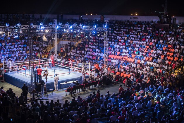 Fans attend the opening of the Bukom Boxing Arena, one of the buildings inside the Trust Sports Emporium complex with a capacity for more than 4000 people, in Accra, November 15, 2016. / AFP / CRISTINA ALDEHUELA        (Photo credit should read CRISTINA ALDEHUELA/AFP/Getty Images)