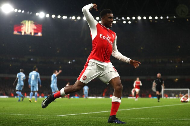 LONDON, ENGLAND - DECEMBER 10: Alex Iwobi of Arsenal celebrates scoring his sides third goal during the Premier League match between Arsenal and Stoke City at the Emirates Stadium on December 10, 2016 in London, England.  (Photo by Julian Finney/Getty Images)