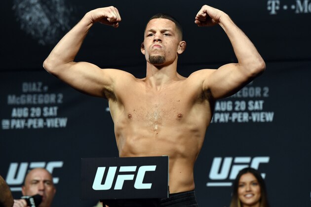 LAS VEGAS, NV - AUGUST 19:  Mixed martial artist Nate Diaz poses on the scale during his weigh-in for UFC 202 at MGM Grand Conference Center on August 19, 2016 in Las Vegas, Nevada. McGregor will meet UFC featherweight champion Conor McGregor in a welterweight rematch on August 20, 2016, at T-Mobile Arena in Las Vegas.  (Photo by Ethan Miller/Getty Images)