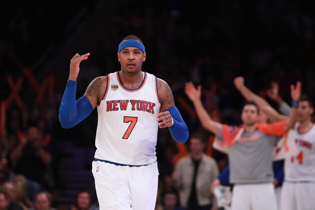 NEW YORK, NY - DECEMBER 04:  Carmelo Anthony #7 of the New York Knicks reacts after making a three pointer against the Sacramento Kings during the second half at Madison Square Garden on December 4, 2016 in New York City. NOTE TO USER: User expressly acknowledges and agrees that, by downloading and or using this photograph, User is consenting to the terms and conditions of the Getty Images License Agreement.  (Photo by Michael Reaves/Getty Images)