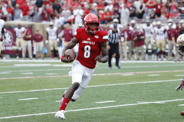 LOUISVILLE, KY - SEPTEMBER 17: Lamar Jackson #8 of the Louisville Cardinals runs with the ball against the Florida State Seminoles during the game at Papa John's Cardinal Stadium on September 17, 2016 in Louisville, Kentucky. Louisville defeated Florida State 63-20. (Photo by Joe Robbins/Getty Images)