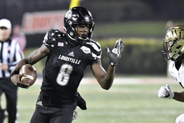 Louisville quarterback Lamar Jackson (8) attempts to evade a Wake Forest pass rusher during the second half of an NCAA college football game against Wake Forest, Saturday, Nov. 12, 2016 in Louisville Ky. (AP Photo/Timothy D. Easley)