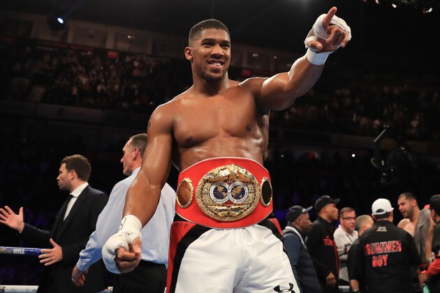 MANCHESTER, ENGLAND - DECEMBER 10:  Anthony Joshua of London celebrates his victory over Eric Molina of the United States during their IBF World Heavyweight Championship fight at Manchester Arena on December 10, 2016 in Manchester, England.  (Photo by Richard Heathcote/Getty Images)