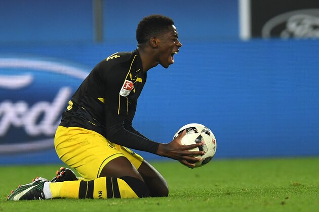 Dortmund's French midfielder Ousmane Dembele reacts during the German first division Bundesliga football match between 1 FC Cologne and Borussia Dortmund in Cologne western Germany, on December 10, 2016.  / AFP / PATRIK STOLLARZ / RESTRICTIONS: DURING MATCH TIME: DFL RULES TO LIMIT THE ONLINE USAGE TO 15 PICTURES PER MATCH AND FORBID IMAGE SEQUENCES TO SIMULATE VIDEO. == RESTRICTED TO EDITORIAL USE == FOR FURTHER QUERIES PLEASE CONTACT DFL DIRECTLY AT + 49 69 650050
        (Photo credit should read PATRIK STOLLARZ/AFP/Getty Images)