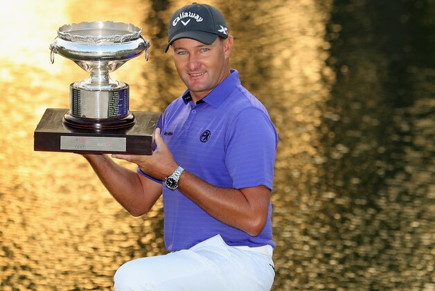 HONG KONG - DECEMBER 11:  Sam Brazel of Australia poses with the trophy after winning the UBS Hong Kong Open at The Hong Kong Golf Club on December 11, 2016 in Hong Kong, Hong Kong.  (Photo by Warren Little/Getty Images)