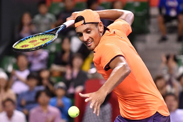 Australia's Nick Kyrgios celebrates his victory over Belgium's David Goffin during the men's singles final at the ATP Japan Open tennis tournament in Tokyo on October 9, 2016. / AFP / KAZUHIRO NOGI        (Photo credit should read KAZUHIRO NOGI/AFP/Getty Images)