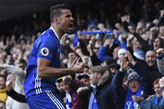 Chelsea's Brazilian-born Spanish striker Diego Costa celebrates after scoring the opening goal of the English Premier League football match between Chelsea and West Bromwich Albion at Stamford Bridge in London on December 11, 2016. / AFP / Justin TALLIS / RESTRICTED TO EDITORIAL USE. No use with unauthorized audio, video, data, fixture lists, club/league logos or 'live' services. Online in-match use limited to 75 images, no video emulation. No use in betting, games or single club/league/player publications.  /         (Photo credit should read JUSTIN TALLIS/AFP/Getty Images)