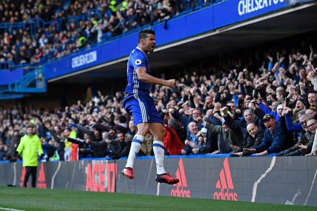 Chelsea's Brazilian-born Spanish striker Diego Costa celebrates after scoring the opening goal of the English Premier League football match between Chelsea and West Bromwich Albion at Stamford Bridge in London on December 11, 2016. / AFP / Justin TALLIS / RESTRICTED TO EDITORIAL USE. No use with unauthorized audio, video, data, fixture lists, club/league logos or 'live' services. Online in-match use limited to 75 images, no video emulation. No use in betting, games or single club/league/player publications.  /         (Photo credit should read JUSTIN TALLIS/AFP/Getty Images)