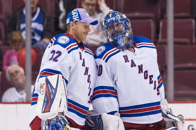 VANCOUVER, BC - NOVEMBER 15: Goalie Henrik Lundqvist #30 of the New York Rangers shares a laugh with teammate Antti Raanta #32 after defeating the Vancouver Canucks 7-2 in NHL action on November 15, 2016 at Rogers Arena in Vancouver, British Columbia, Canada.  (Photo by Rich Lam/Getty Images)