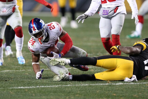 PITTSBURGH, PA - DECEMBER 04:  Eli Apple #24 of the New York Giants makes an interception during the game against the Pittsburgh Steelers at Heinz Field on December 4, 2016 in Pittsburgh, Pennsylvania. The Steelers defeated the Giants 24-14.  (Photo by Rob Leiter via Getty Images)
