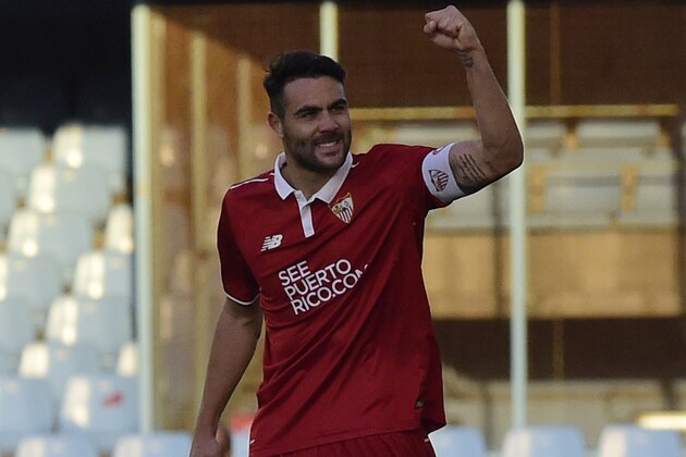 Sevilla's midfielder Vicente Iborra celebrates after scoring during the Spanish league football match RC Celta de Vigo vs Sevilla FC at the Balaidos stadium in Vigo on December 11, 2016.
Sevilla won 3-0. / AFP / MIGUEL RIOPA        (Photo credit should read MIGUEL RIOPA/AFP/Getty Images)