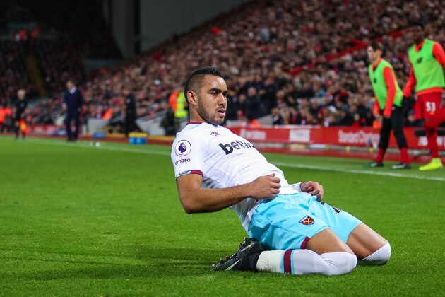 LIVERPOOL, ENGLAND - DECEMBER 11: Dimitri Payet of West Ham United celebrates after scoring a goal to make it 1-1 during the Premier League match between Liverpool and West Ham United at Anfield on December 11, 2016 in Liverpool, England. (Photo by Robbie Jay Barratt - AMA/Getty Images)