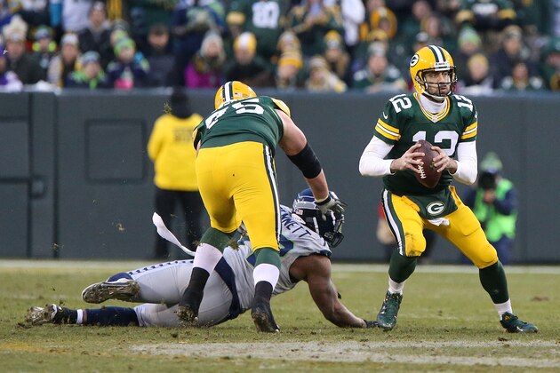 GREEN BAY, WI - DECEMBER 11: Aaron Rodgers #12 of the Green Bay Packers looks down field during the first half of a game against the Seattle Seahawks at Lambeau Field on December 11, 2016 in Green Bay, Wisconsin.  (Photo by Dylan Buell/Getty Images)