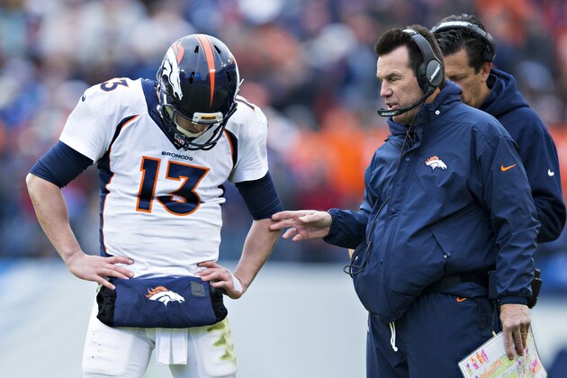 NASHVILLE, TN - DECEMBER 11:  Head Coach Gary Kubiak and Trevor Siemian #13 of the Denver Broncos talk during a timeout against the Tennessee Titans at Nissan Stadium on December 11, 2016 in Nashville, Tennessee.  The Titans defeated the Broncos 13-10.  (Photo by Wesley Hitt/Getty Images)