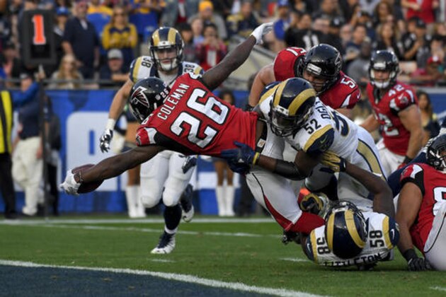 Atlanta Falcons running back Tevin Coleman scores against the Los Angeles Rams during the second half of an NFL football game Sunday, Dec. 11, 2016, in Los Angeles. (AP Photo/Mark J. Terrill)