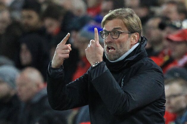 Liverpool's German manager Jurgen Klopp gestures from the touchline during the English Premier League football match between Liverpool and West Ham United at Anfield in Liverpool, north west England on December 11, 2016. / AFP / Lindsey PARNABY / RESTRICTED TO EDITORIAL USE. No use with unauthorized audio, video, data, fixture lists, club/league logos or 'live' services. Online in-match use limited to 75 images, no video emulation. No use in betting, games or single club/league/player publications.  /         (Photo credit should read LINDSEY PARNABY/AFP/Getty Images)