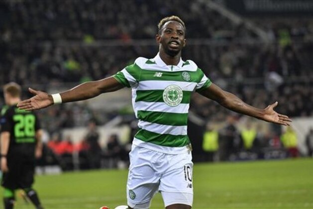 Celtic's Moussa Dembele celebrates after scoring a penalty during the Champions League group C soccer match between Borussia Moenchengladbach and Celtic FC in Moenchengladbach, Germany, Tuesday, Nov. 1, 2016. (AP Photo/Martin Meissner)