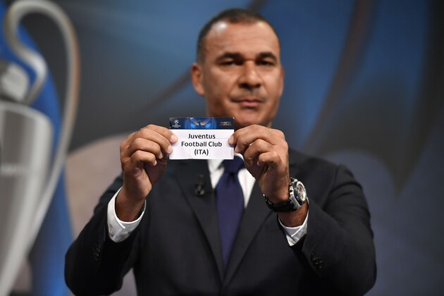 Netherlands' former striker Ruud Gullit shows the name of Juventus during the draw for the round of 16 of the UEFA Champions League football tournament at the UEFA headquarters in Nyon on December 12, 2016. / AFP / Fabrice COFFRINI        (Photo credit should read FABRICE COFFRINI/AFP/Getty Images)