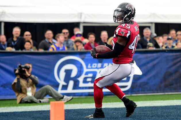 LOS ANGELES, CA - DECEMBER 11:  Deion Jones #45 of the Atlanta Falcons reacts to his touchdown from his interception for a 21-0 lead  during the second quarter against the Los Angeles Rams at Los Angeles Memorial Coliseum on December 11, 2016 in Los Angeles, California.  (Photo by Harry How/Getty Images)