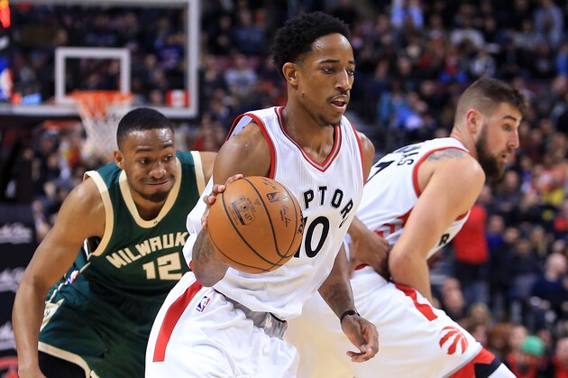 TORONTO, ON - DECEMBER 12:  DeMar DeRozan #10 of the Toronto Raptors dribbles the ball as during the second half of an NBA game against the Milwaukee Bucks at Air Canada Centre on December 12, 2016 in Toronto, Canada.  NOTE TO USER: User expressly acknowledges and agrees that, by downloading and or using this photograph, User is consenting to the terms and conditions of the Getty Images License Agreement.  (Photo by Vaughn Ridley/Getty Images)