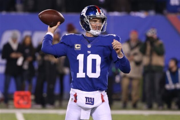 New York Giants quarterback Eli Manning (10) throws a pass during the first half of an NFL football game against the Dallas Cowboys Sunday, Dec. 11, 2016, in East Rutherford, N.J. (AP Photo/Seth Wenig)