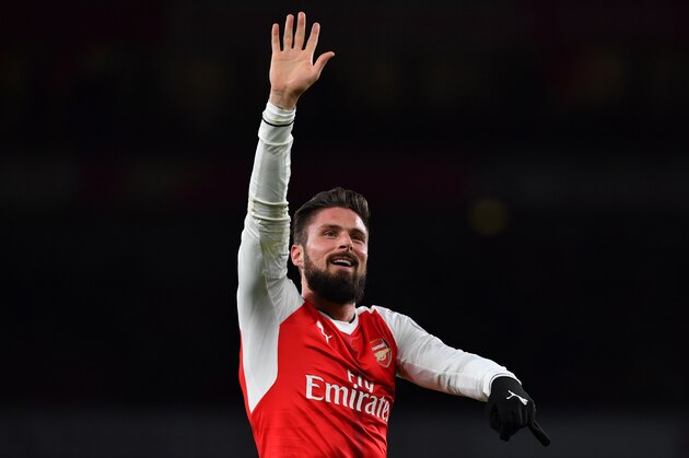 Arsenal's French striker Olivier Giroud gestures on the pitch after the English Premier League football match between Arsenal and Bournemouth at the Emirates Stadium in London on November 27, 2016.
Arsenal won the game 3-1. / AFP / Ben STANSALL / RESTRICTED TO EDITORIAL USE. No use with unauthorized audio, video, data, fixture lists, club/league logos or 'live' services. Online in-match use limited to 75 images, no video emulation. No use in betting, games or single club/league/player publications. / (Photo credit should read BEN STANSALL/AFP/Getty Images) Arsenal's French striker Olivier Giroud gestures on the pitch after the English Premier League football match between Arsenal and Bournemouth at the Emirates Stadium in London on November 27, 2016.
Arsenal won the game 3-1. / AFP / Ben STANSALL / RESTRICTED TO EDITORIAL USE. No use with unauthorized audio, video, data, fixture lists, club/league logos or 'live' services. Online in-match use limited to 75 images, no video emulation. No use in betting, games or single club/league/player publications. / (Photo credit should read BEN STANSALL/AFP/Getty Images)
