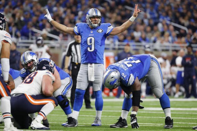 Detroit Lions quarterback Matthew Stafford (9) signals against the Chicago Bears in the second half of an NFL football game in Detroit, Sunday, Dec. 11, 2016. (AP Photo/Rick Osentoski)