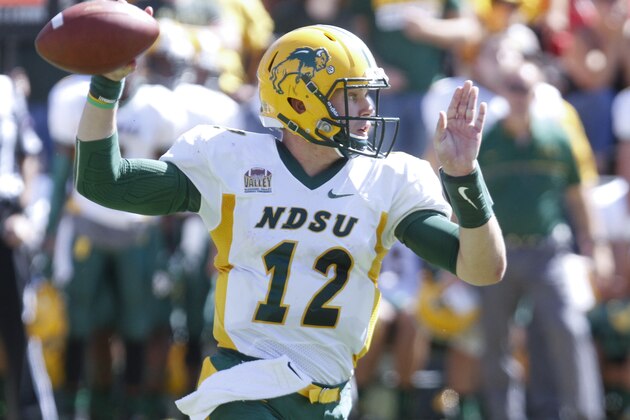 IOWA CITY, IOWA- SEPTEMBER 17:  Quarterback Easton Stick #12 of the North Dakota State Bison drops back for a pass in the second quarter against the Iowa Hawkeyes, on September 17, 2016 at Kinnick Stadium in Iowa City, Iowa.  (Photo by Matthew Holst/Getty Images)
