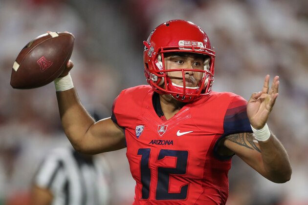GLENDALE, AZ - SEPTEMBER 03:  Quarterback Anu Solomon #12 of the Arizona Wildcats scrambles to pass during the college football game against the Brigham Young Cougars at University of Phoenix Stadium on September 3, 2016 in Glendale, Arizona. The Cougars defeated the Wildcats 18-16.  (Photo by Christian Petersen/Getty Images)