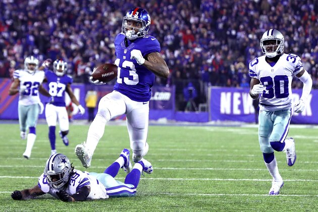EAST RUTHERFORD, NJ - DECEMBER 11:  Odell Beckham Jr. #13 of the New York Giants runs the ball to the end zone to score a 61 yard touchdown against the Dallas Cowboys during the third quarter of the game at MetLife Stadium on December 11, 2016 in East Rutherford, New Jersey.  (Photo by Al Bello/Getty Images)