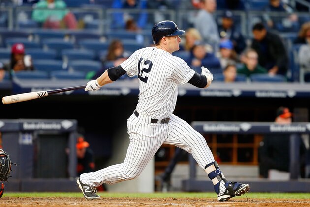 NEW YORK, NY - OCTOBER 01:  Chase Headley #12 of the New York Yankees follows through on a sixth inning RBI double against the Baltimore Orioles at Yankee Stadium on October 1, 2016 in the Bronx borough of New York City.  (Photo by Jim McIsaac/Getty Images)