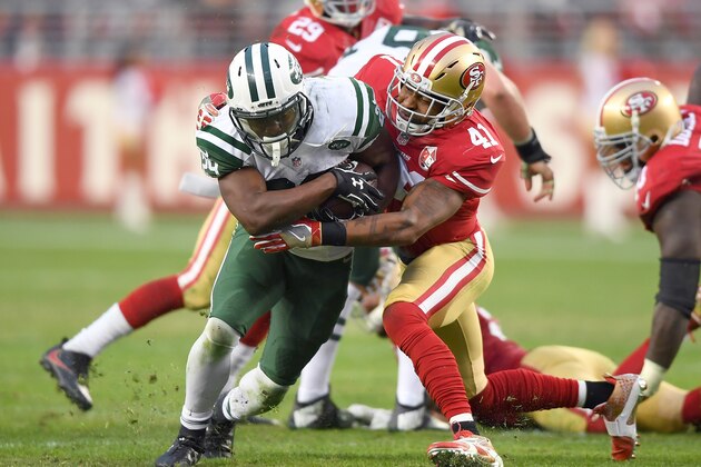 SANTA CLARA, CA - DECEMBER 11:  Bilal Powell #29 of the New York Jets gets tackled by Antoine Bethea #41 of the San Francisco 49ers in overtime during their NFL football game at Levi's Stadium on December 11, 2016 in Santa Clara, California.  (Photo by Thearon W. Henderson/Getty Images)