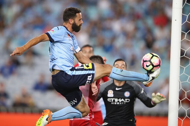 SYDNEY, AUSTRALIA - DECEMBER 09: Alex Brosque of Sydney FC jumps to shoot at goal during the round 10 A-League match between Sydney FC and Melbourne City FC at ANZ Stadium on December 9, 2016 in Sydney, Australia.  (Photo by Mark Kolbe/Getty Images)