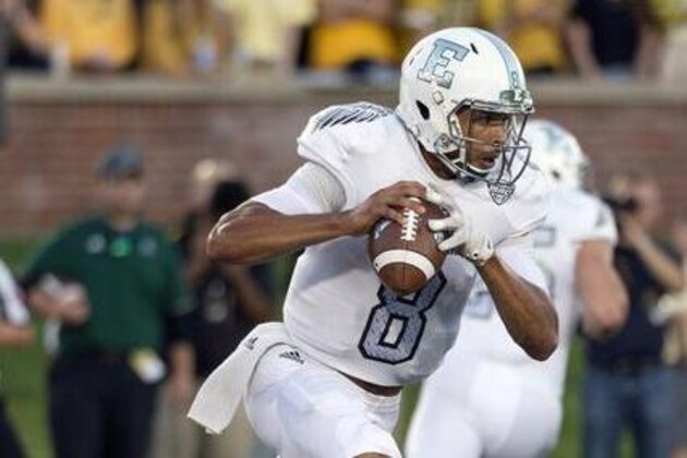 FILE- In this Sept. 10, 2016, file photo, Eastern Michigan quarterback Todd Porter scrambles out of the pocket during the first quarter of an NCAA college football game against Missouri, in Columbia, Mo. After a turbulent offseason in which the school hierarchy had to reaffirm its commitment to playing Division I football at all, Eastern Michigan is off to its best start since 1995. The Eagles improved to 4-1 last weekend with a win over defending MAC champion Bowling Green. (AP Photo/L.G. Patterson)