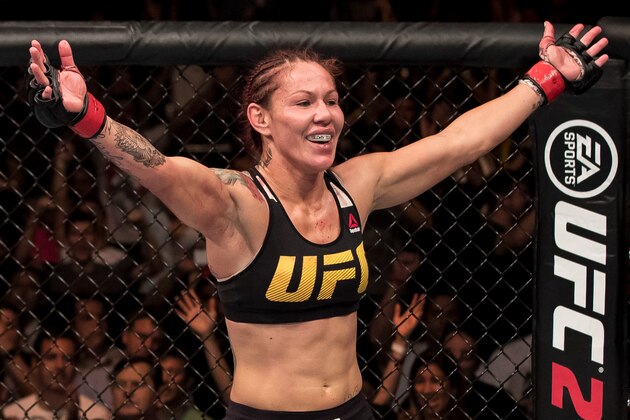 BRASILIA, BRAZIL - SEPTEMBER 24: Cris Cyborg of Brazil celebrates victory over Lina Lansberg of Sweden in their catchweight UFC bout during the UFC Fight Night event at Nilson Nelson gymnasium on September 24, 2016 in Brasilia, Brazil. (Photo by Buda Mendes/Zuffa LLC/Zuffa LLC via Getty Images)