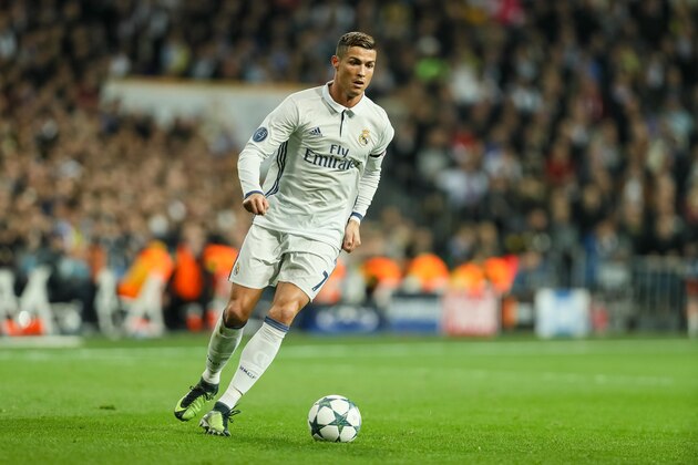 MADRID, SPAIN - DECEMBER 07: Cristiano Ronaldo of Real Madrid in action  during the UEFA Champions League match between Real Madrid CF and Borussia Dortmund at Bernabeu on December 7, 2016 in Madrid. (Photo by TF-Images/Getty Images)