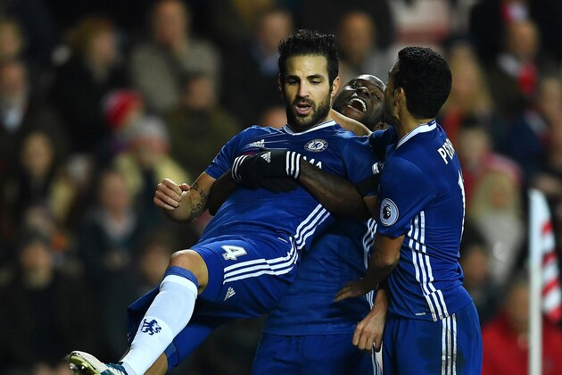 SUNDERLAND, ENGLAND - DECEMBER 14:  Cesc Fabregas of Chelsea celebrates scoring his sides first goal with his Chelsea team mates during the Premier League match between Sunderland and Chelsea at Stadium of Light on December 14, 2016 in Sunderland, England.  (Photo by Laurence Griffiths/Getty Images)