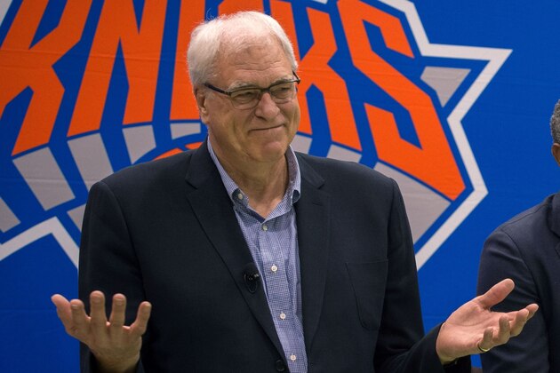 (L-R) New York Knicks President Phil Jackson, General Manager Steven Mills Coach Jeff Hornacek speak with the media at Madison Square Garden training center on July 8, 2016 in Tarrytown, New York. / AFP / Bryan R. Smith        (Photo credit should read BRYAN R. SMITH/AFP/Getty Images)