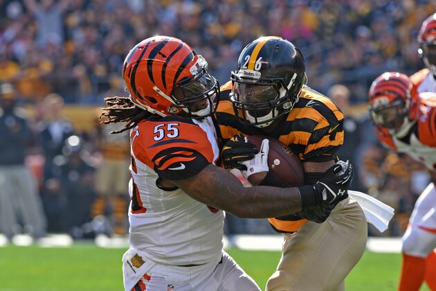 PITTSBURGH, PA - NOVEMBER 1:  Linebacker Vontaze Burfict #55 of the Cincinnati Bengals tackles running back Le'Veon Bell #26 of the Pittsburgh Steelers during a game at Heinz Field on November 1, 2015 in Pittsburgh, Pennsylvania.  The Bengals defeated the Steelers 16-10. (Photo by George Gojkovich/Getty Images)