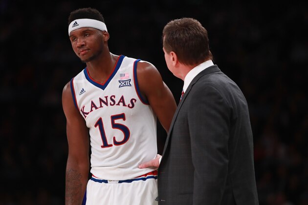 NEW YORK, NY - NOVEMBER 15:  Carlton Bragg Jr. #15 of the Kansas Jayhawks talks with head coach Bill Self against the Duke Blue Devils in the second half during the State Farm Champions Classic at Madison Square Garden on November 15, 2016 in New York City.  (Photo by Michael Reaves/Getty Images)
