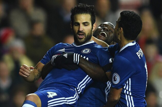 SUNDERLAND, ENGLAND - DECEMBER 14:  Cesc Fabregas (L) of Chelsea celebrates scoring his sides first goal with his Chelsea team mates Victor Moses (C) and Pedro (R) during the Premier League match between Sunderland and Chelsea at Stadium of Light on December 14, 2016 in Sunderland, England.  (Photo by Laurence Griffiths/Getty Images)