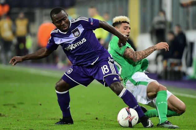 AS Saint-Etienne's French defender Kevin Malcuit (R) and RSC Anderlecht's Ghanian forward Frank Acheampong (L) vie for the ball during the UEFA Europa League football match between RSCA Anderlecht and AS Saint-Etienne at the Constant Vanden Stock Stadium in Brussels on December 8, 2016. / AFP / EMMANUEL DUNAND        (Photo credit should read EMMANUEL DUNAND/AFP/Getty Images)