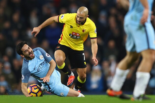 MANCHESTER, ENGLAND - DECEMBER 14: Ilkay Gundogan of Manchester City is fouled by Nordin Amrabat of Watford leading to Gundogan being substituted through injury during the Premier League match between Manchester City and Watford at the Etihad Stadium on December 14, 2016 in Manchester, England. (Photo by Michael Steele/Getty Images) MANCHESTER, ENGLAND - DECEMBER 14: Ilkay Gundogan of Manchester City is fouled by Nordin Amrabat of Watford leading to Gundogan being substituted through injury during the Premier League match between Manchester City and Watford at the Etihad Stadium on December 14, 2016 in Manchester, England. (Photo by Michael Steele/Getty Images)