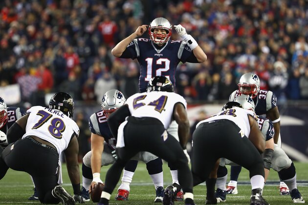 FOXBORO, MA - DECEMBER 12:  Tom Brady #12 of the New England Patriots communicates at the line of scrimmage during the first half against the Baltimore Ravens at Gillette Stadium on December 12, 2016 in Foxboro, Massachusetts.  (Photo by Adam Glanzman/Getty Images)