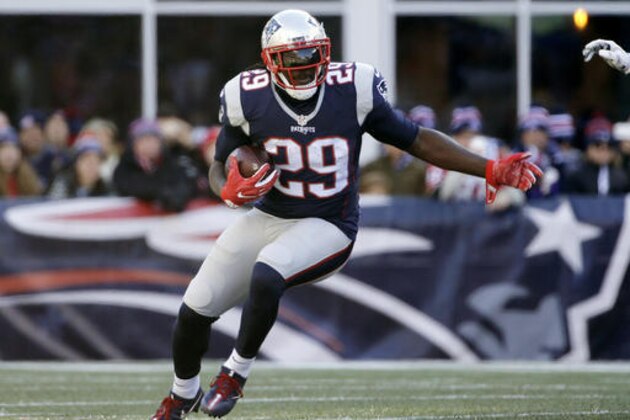 New England Patriots running back LeGarrette Blount carries the ball against the Los Angeles Rams during the first half of an NFL football game, Sunday, Dec. 4, 2016, in Foxborough, Mass. (AP Photo/Elise Amendola)