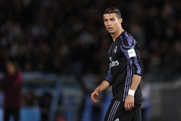 YOKOHAMA, JAPAN - DECEMBER 15:  Cristiano Ronaldo of Real Madrid looks on during the FIFA Club World Cup Semi Final match between Club America and Real Madrid at International Stadium Yokohama on December 15, 2016 in Yokohama, Japan.  (Photo by Matthew Ashton - AMA/Getty Images)